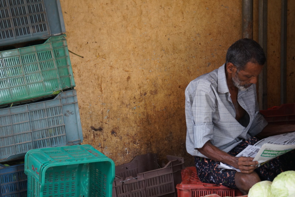 Reading newspaper